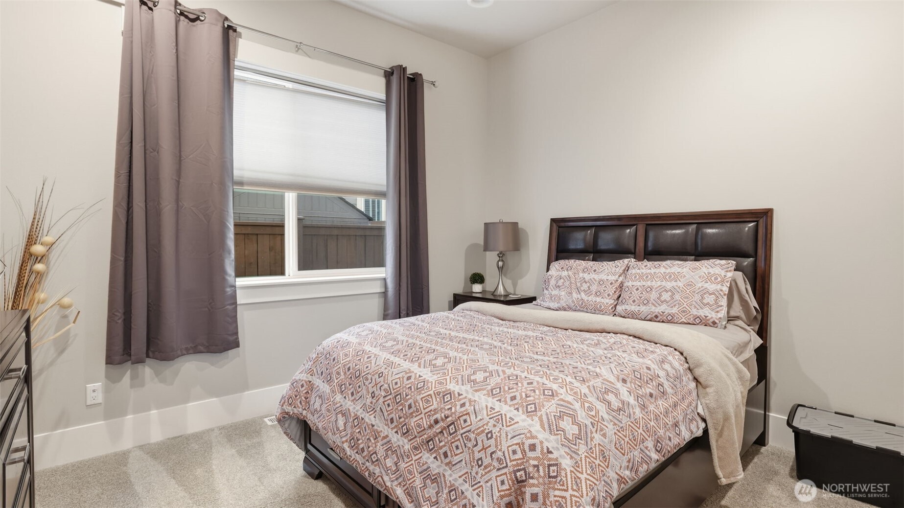 6508 Southeast 7th Place Renton, WA 98059 - Photo 17 of 32 a bedroom with a bed and a window