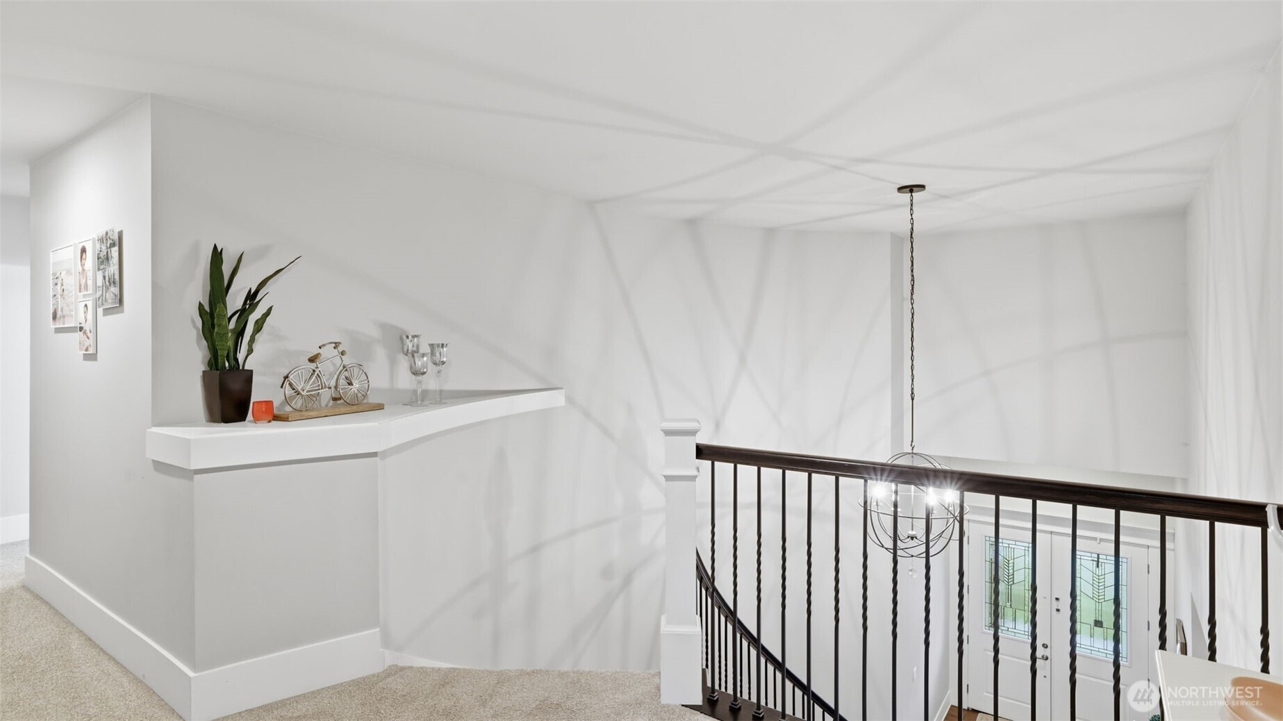 6508 Southeast 7th Place Renton, WA 98059 - Photo 19 of 32 a view of a hallway to a bedroom