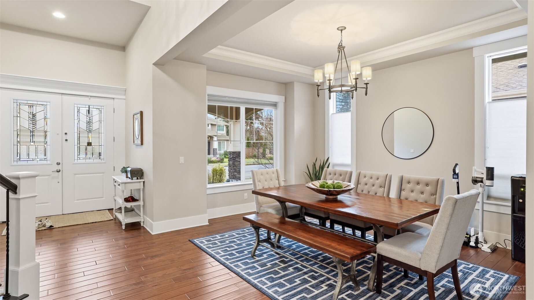 6508 Southeast 7th Place Renton, WA 98059 - Photo 7 of 32 a living room with furniture a window and a chandelier