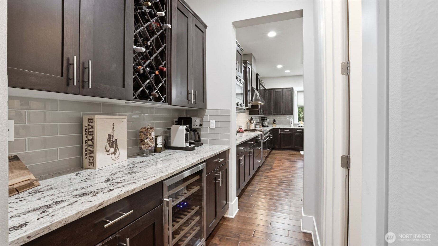 6508 Southeast 7th Place Renton, WA 98059 - Photo 8 of 32 a kitchen with granite countertop a sink and a stove