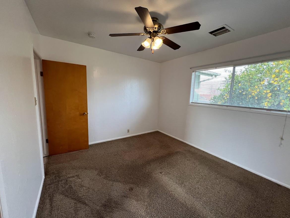 16109 East Manning Reedley, CA 93654 - Photo 20 of 30 a view of an empty room with a window