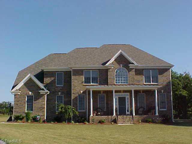 5705 Cape Fox Drive Oak Ridge, NC 27310 - Photo 1 of 8 Exterior Front. 5705 Cape Fox