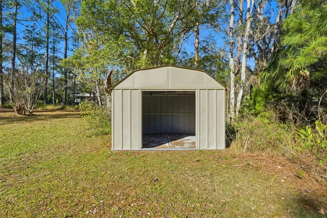 a house view with a garden space