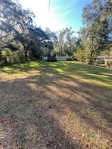 a view of building with trees