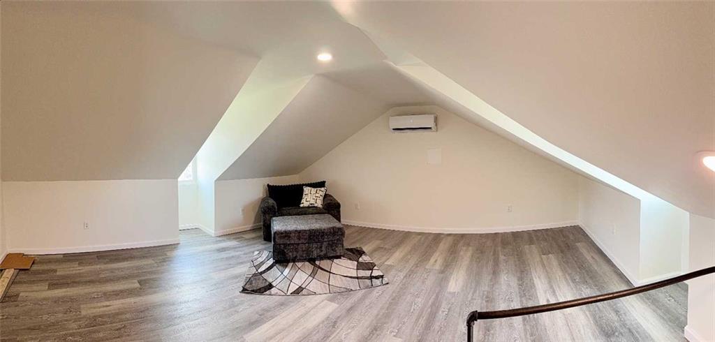 437 Sapphire Way Pittsburgh, PA 15224 - Photo 19 of 20 a view of entryway and hall with wooden floor