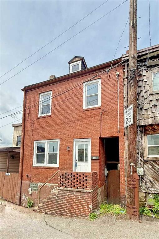 437 Sapphire Way Pittsburgh, PA 15224 - Photo 20 of 20 a front view of a house with a yard