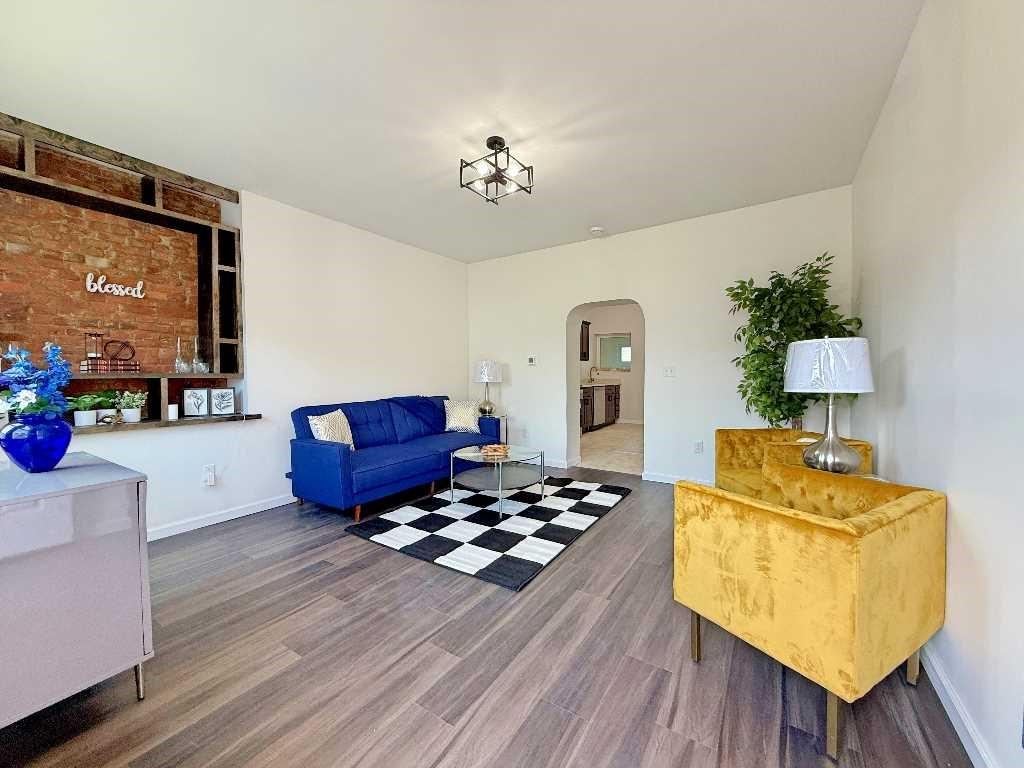 437 Sapphire Way Pittsburgh, PA 15224 - Photo 2 of 20 a living room with furniture and a flat screen tv