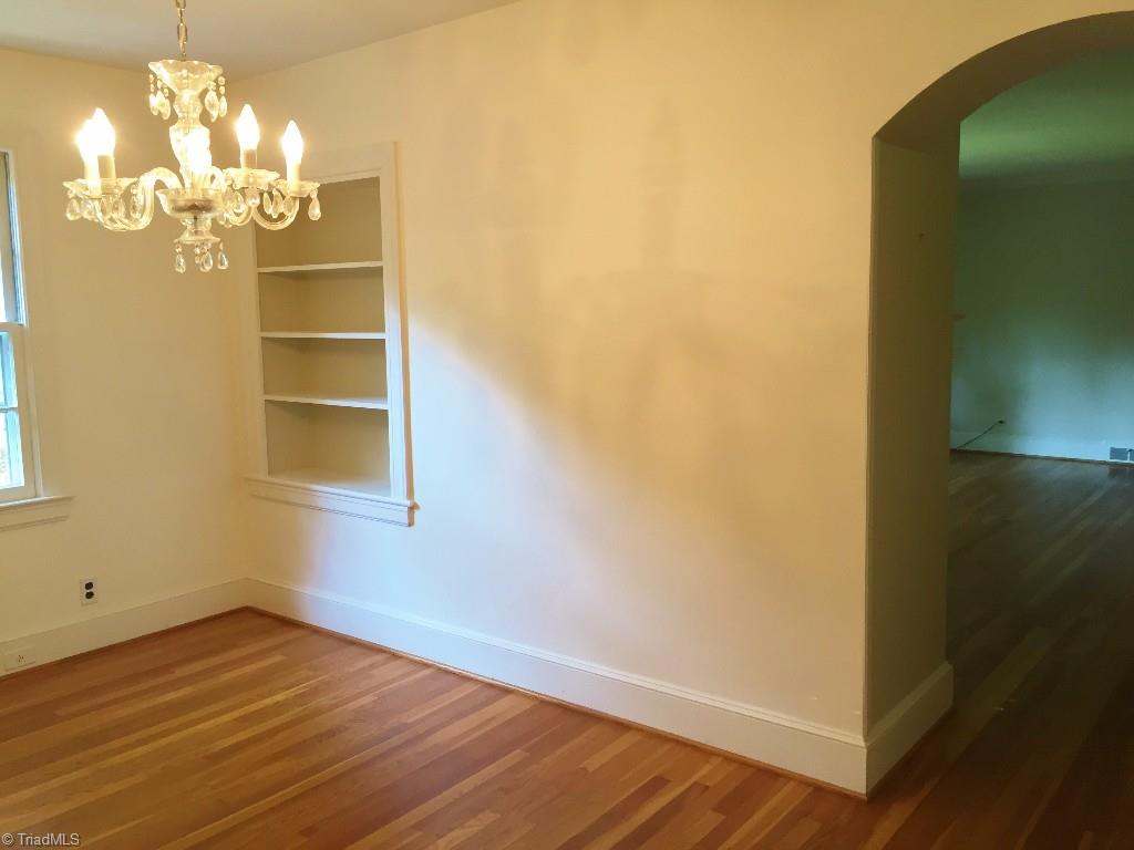 3030 University Road Winston-Salem, NC 27104 - Photo 4 of 15 Dining Room has arched doorway and built-in shelving