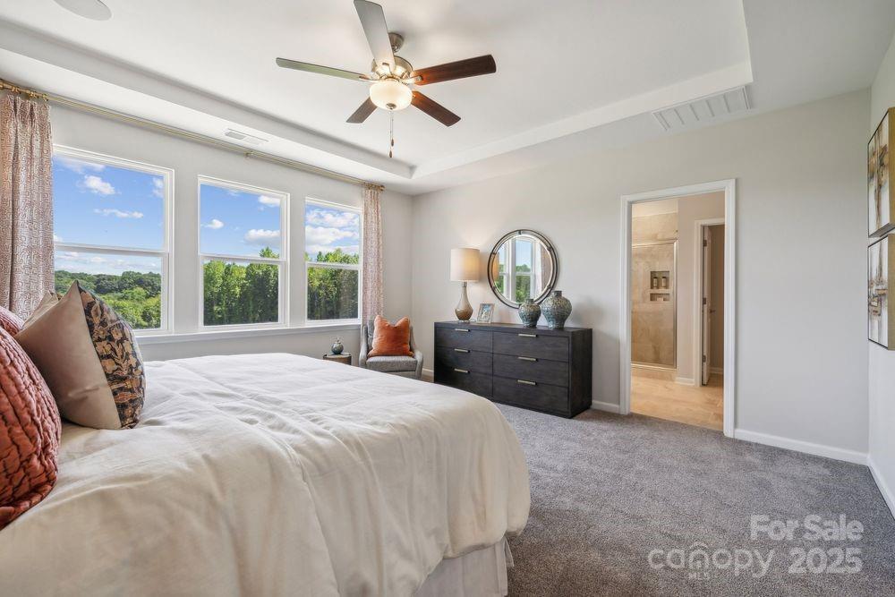 3132 Beacon Hts Road Indian Land, SC 29707 - Photo 14 of 34 a bed room with a bed and a large window