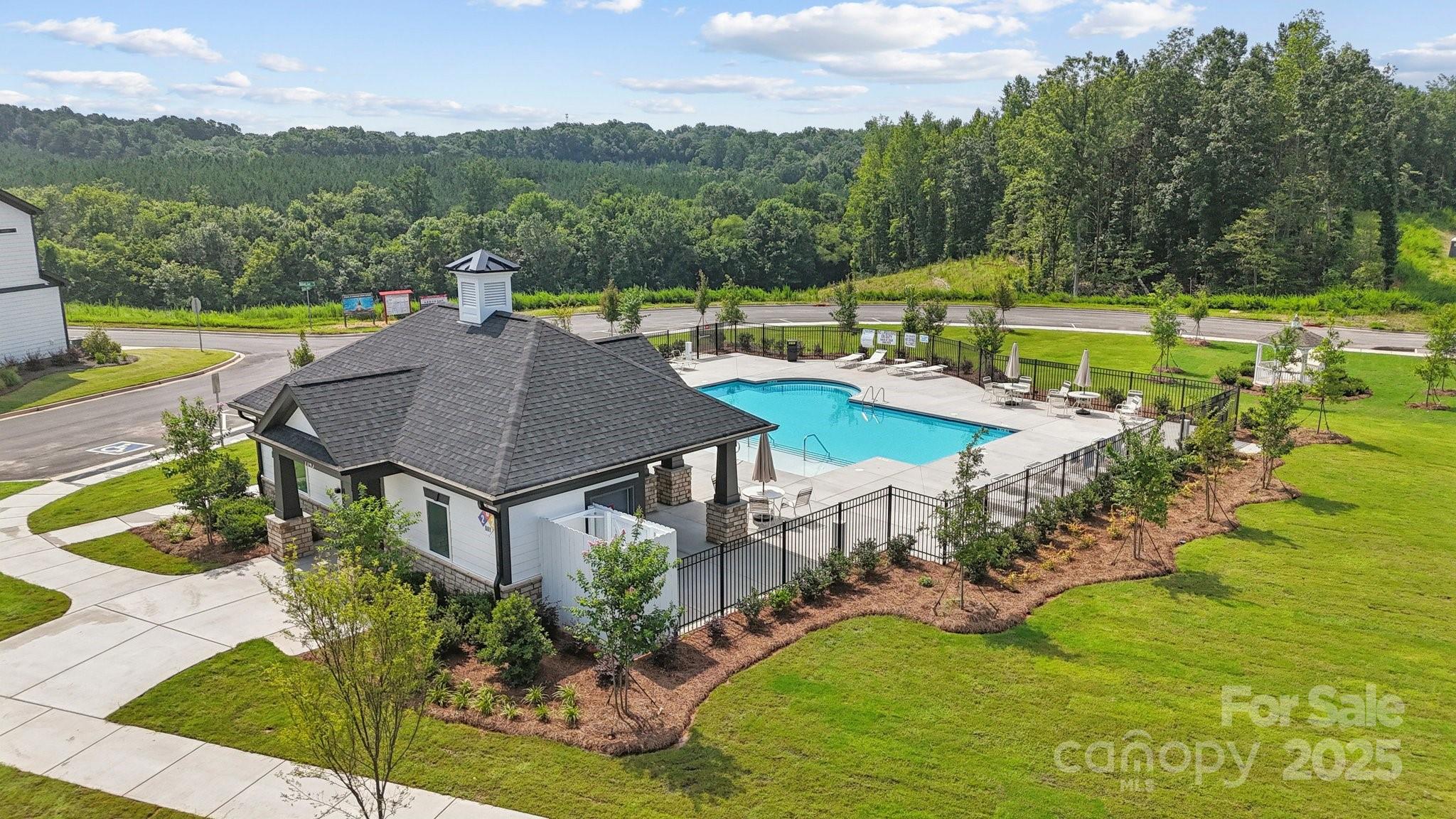 3132 Beacon Hts Road Indian Land, SC 29707 - Photo 29 of 34 an aerial view of a house with garden space and ocean view