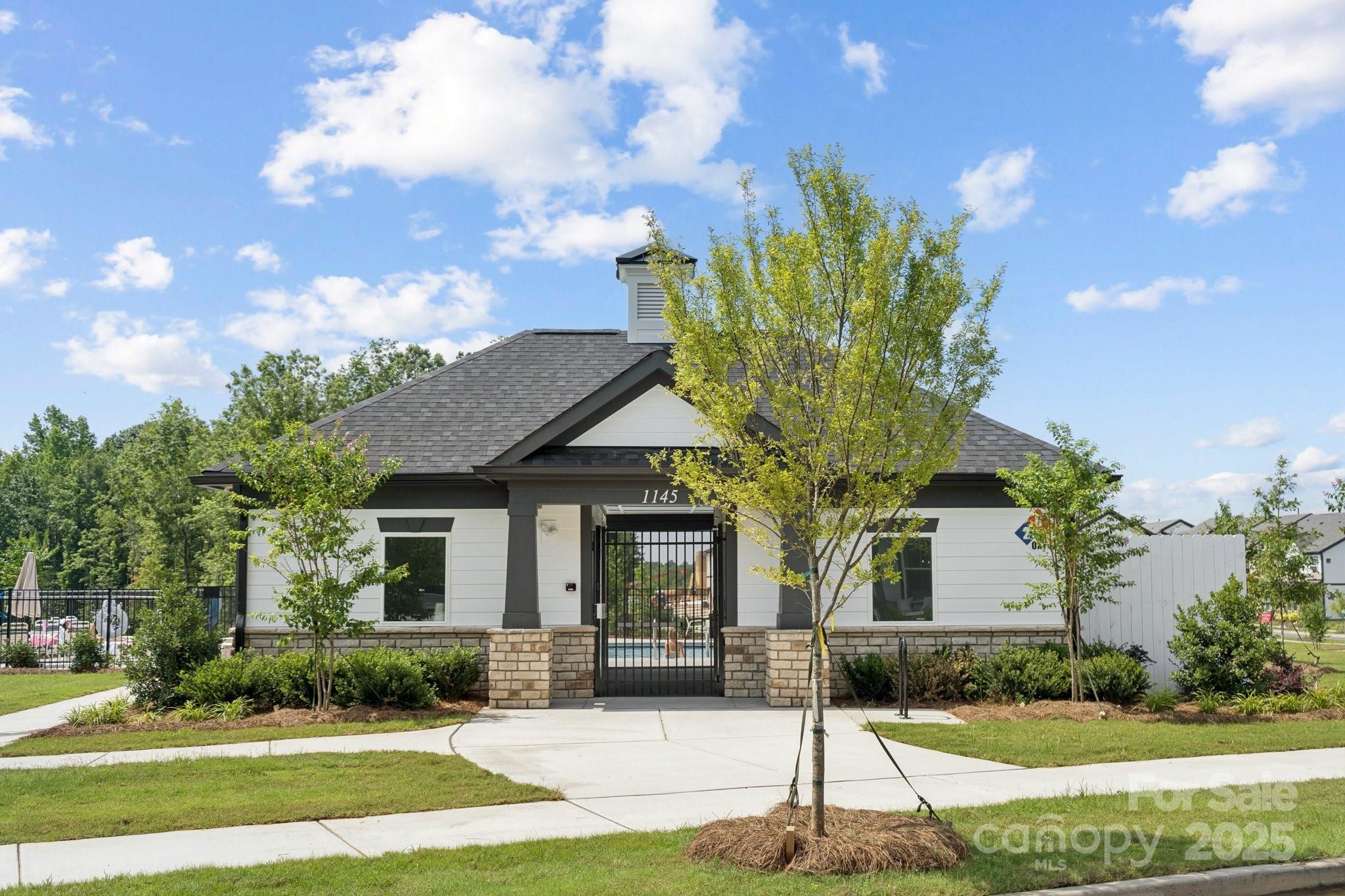 3132 Beacon Hts Road Indian Land, SC 29707 - Photo 33 of 34 a view of a house with a yard