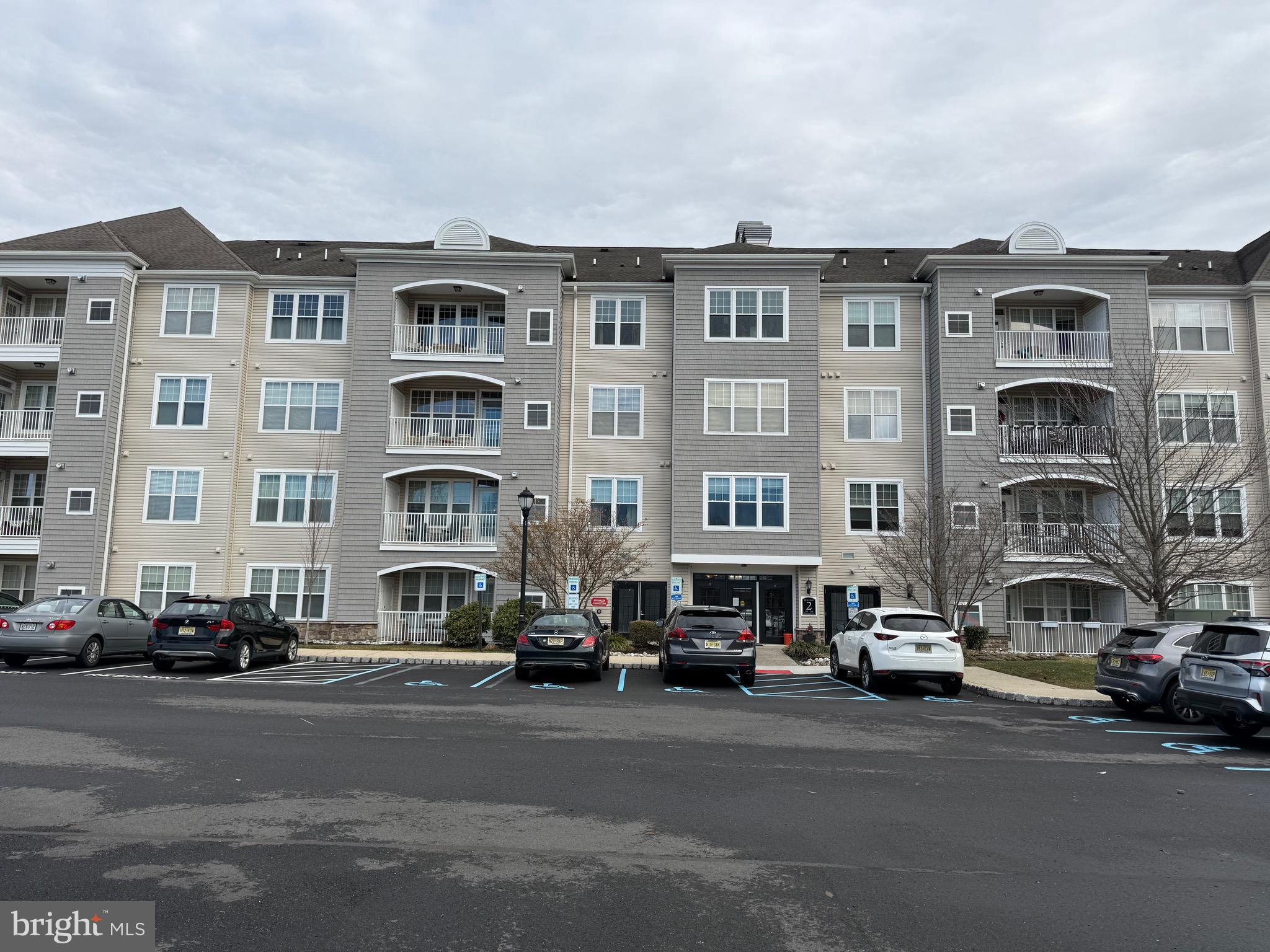 231 Masterson Court Ewing, NJ 08618 - Photo 1 of 43 a buildings with car parked in front of it