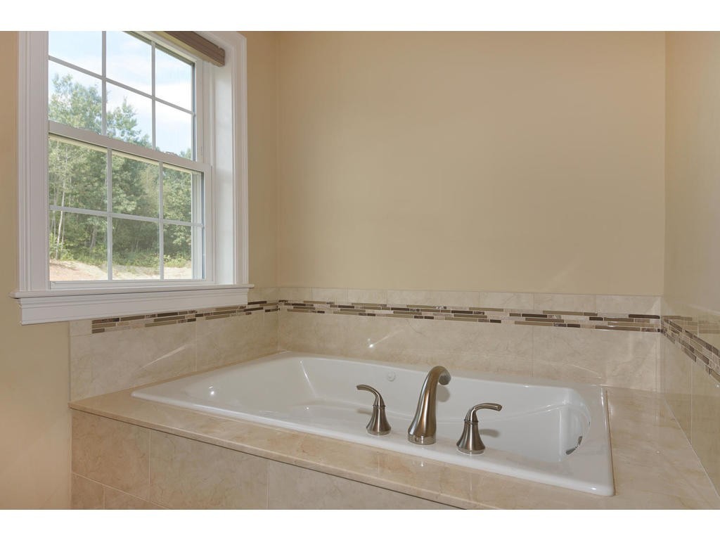50 Fox Run Road Bolton, MA 01740 - Photo 18 of 20 a bathroom with a bathtub