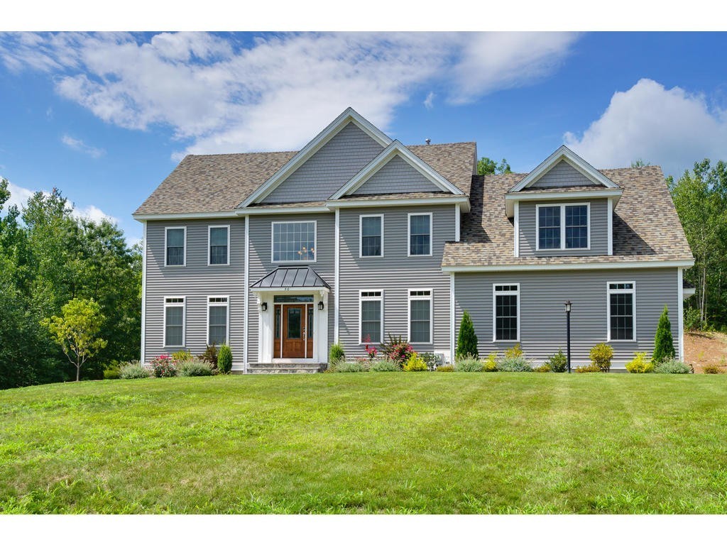 50 Fox Run Road Bolton, MA 01740 - Photo 20 of 20 a front view of house with yard and green space