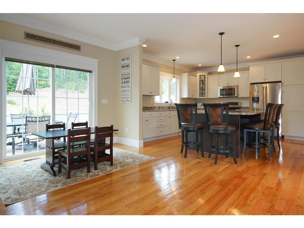 50 Fox Run Road Bolton, MA 01740 - Photo 2 of 20 a view of a dining room with furniture window and outside view