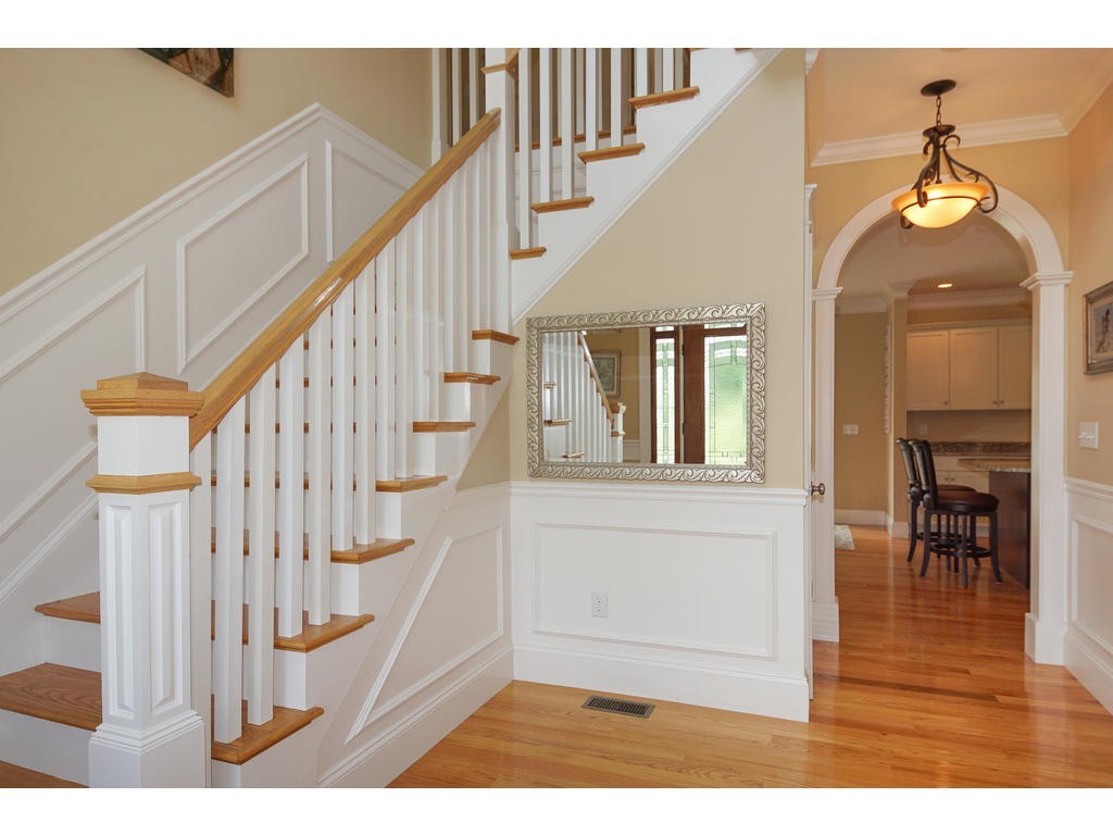 50 Fox Run Road Bolton, MA 01740 - Photo 9 of 20 a view of entryway and hall with wooden floor