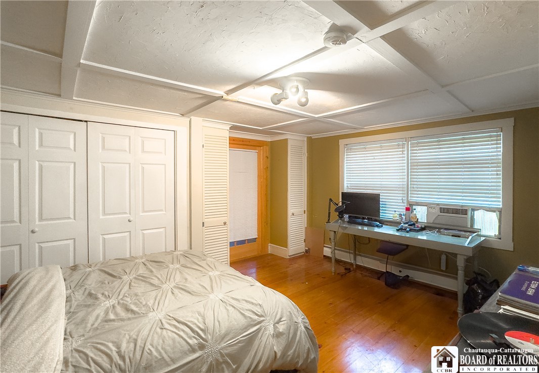 4994 West Lake Road Chautauqua, NY 14757 - Photo 22 of 36 with access to the unfinished storage/gallery area