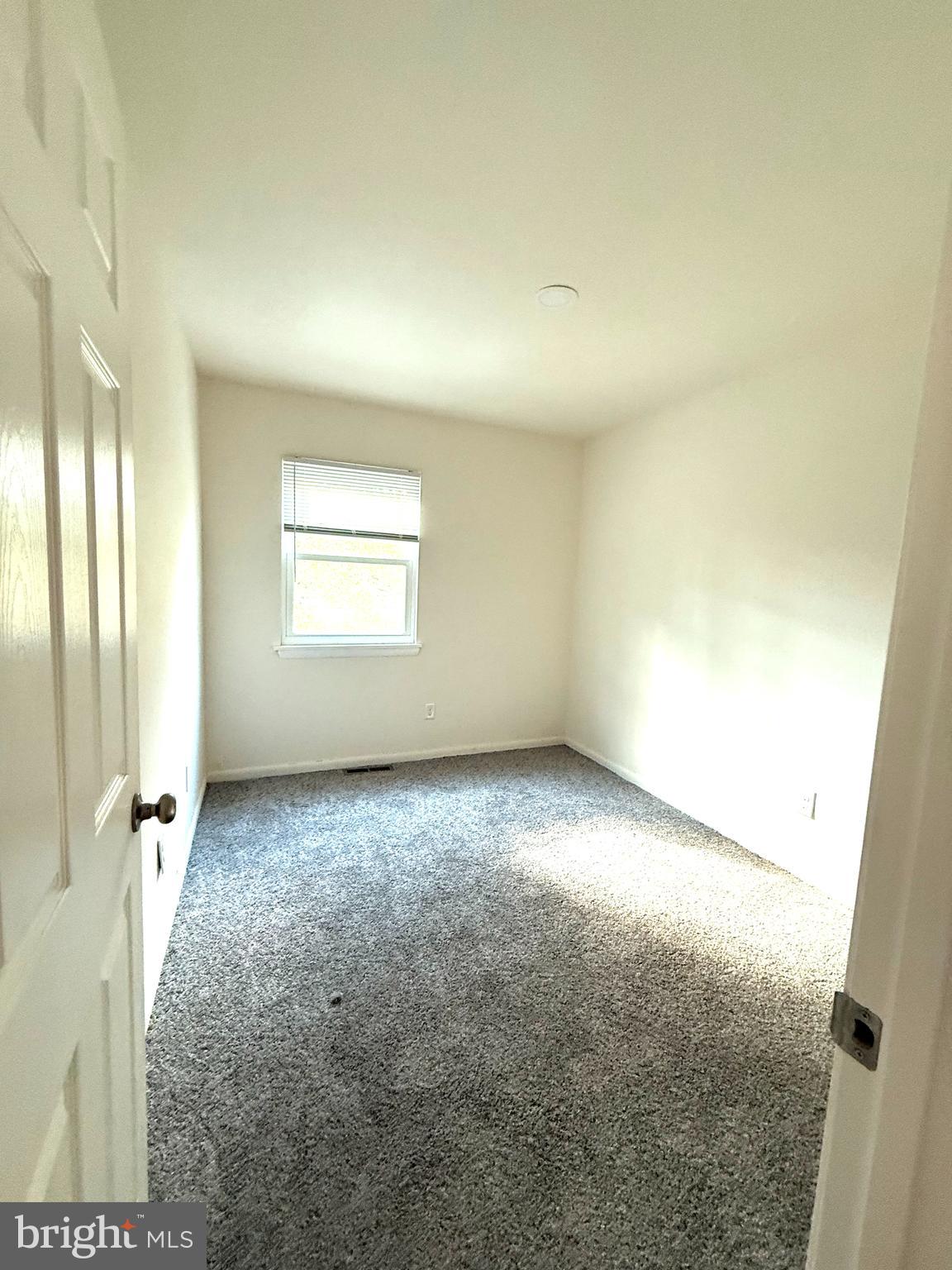 124 Spruance Road Dover, DE 19901 - Photo 11 of 17 an empty room with windows