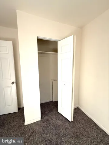 a view of a bathroom with a glass door