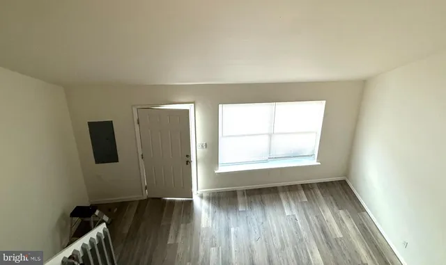 a kitchen with stainless steel appliances a refrigerator sink and microwave