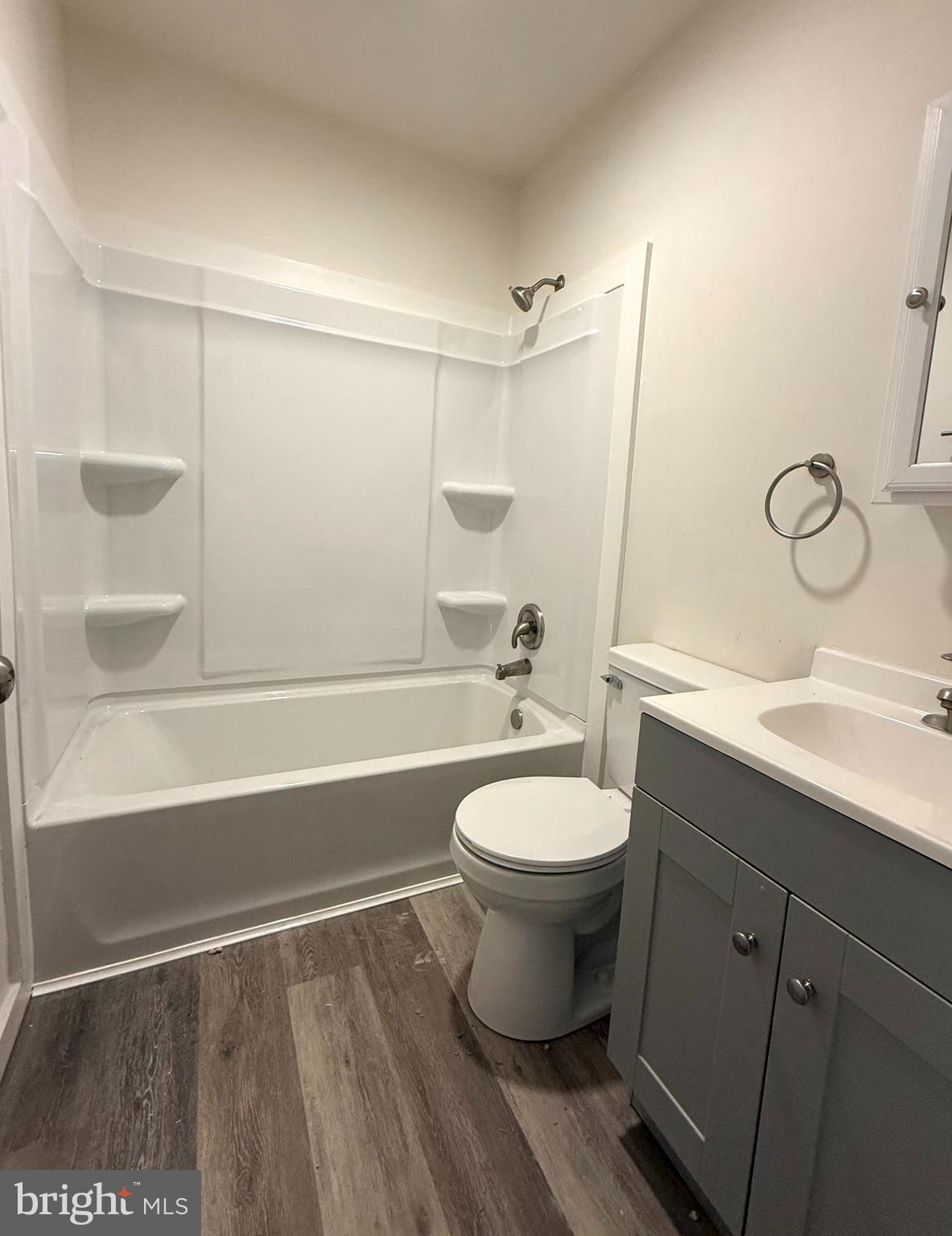 124 Spruance Road Dover, DE 19901 - Photo 9 of 17 a bathroom with a sink a toilet and shower
