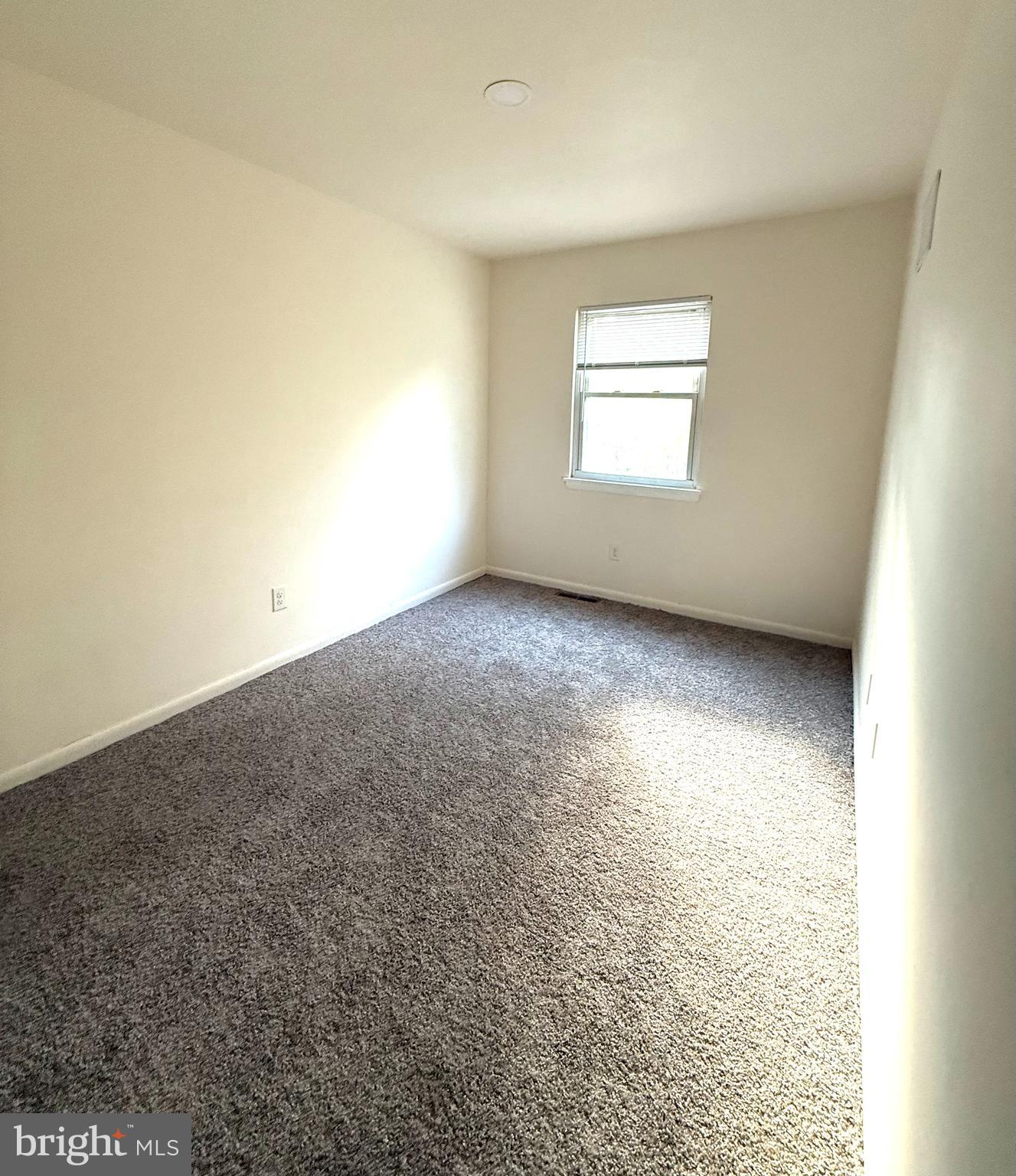 124 Spruance Road Dover, DE 19901 - Photo 10 of 17 an empty room with windows