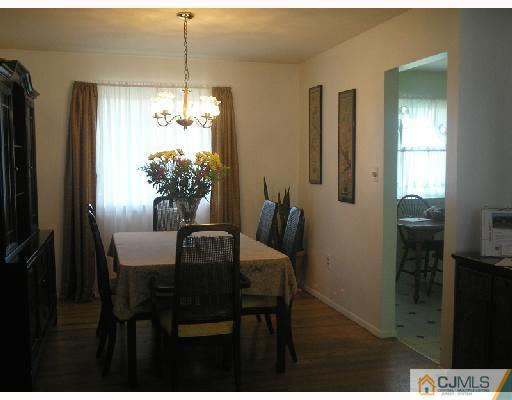 35 Warrenville Road Middlesex, NJ 08846 - Photo 3 of 10 a dining room with furniture and window