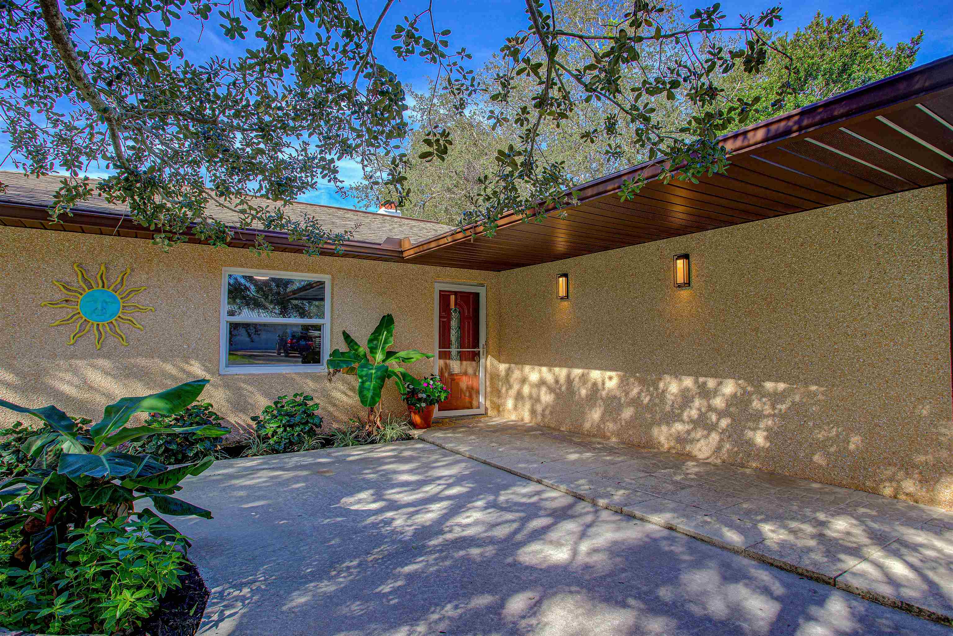 412 Gentian Road St. Augustine, FL 32086 - Photo 16 of 58 a front view of a house with a yard