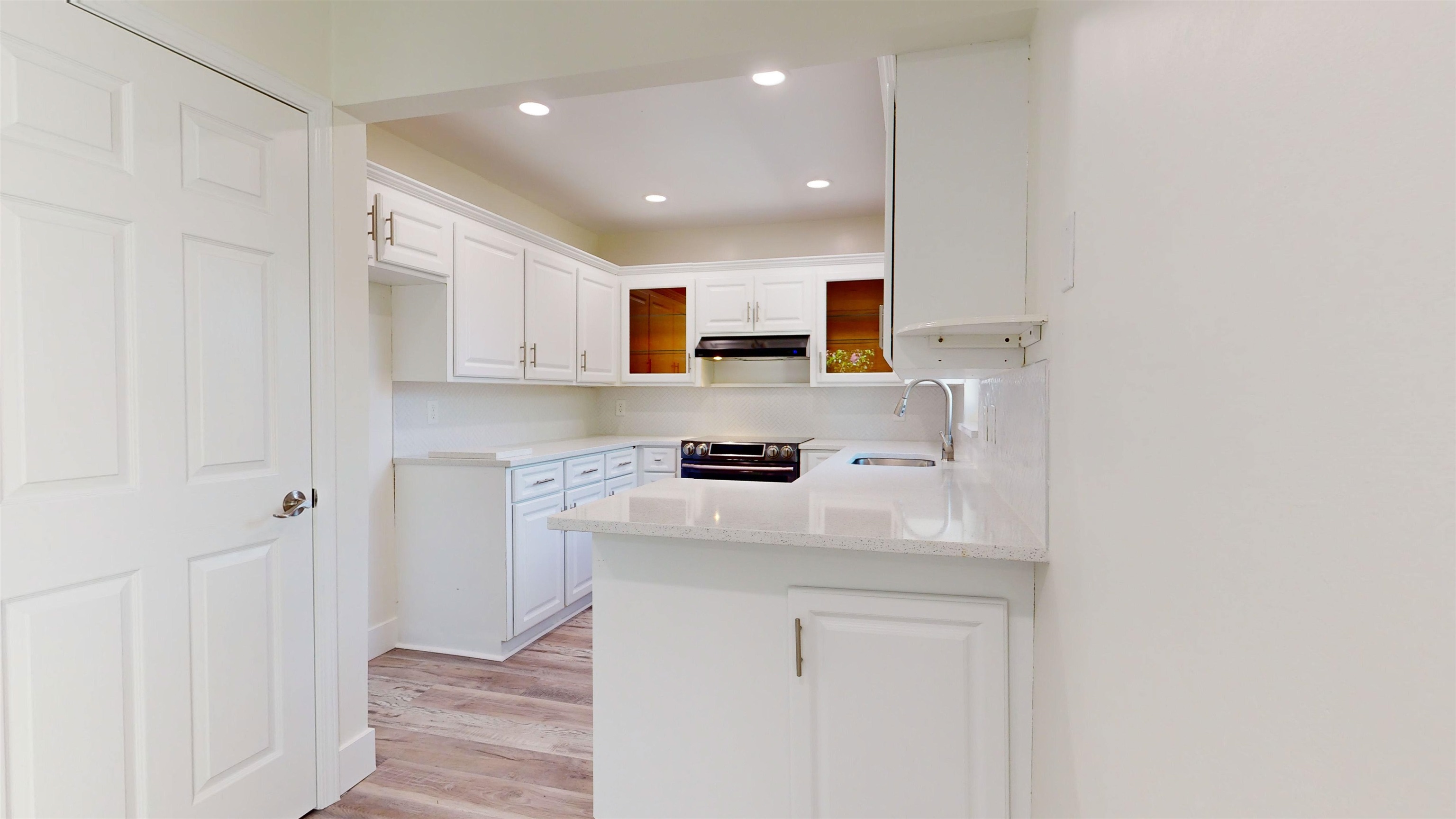 412 Gentian Road St. Augustine, FL 32086 - Photo 23 of 58 a kitchen with stainless steel appliances granite countertop a sink and a refrigerator