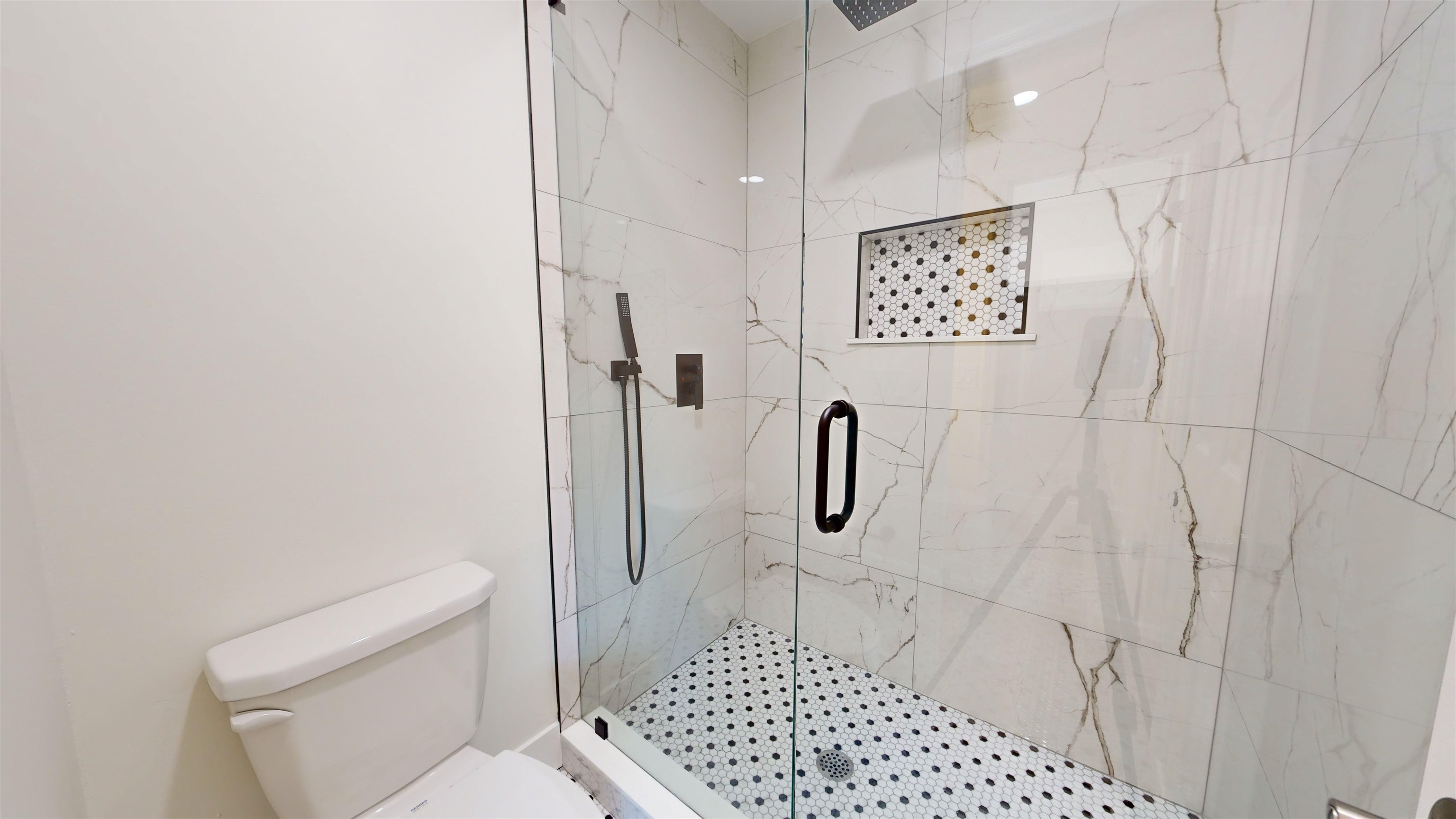 412 Gentian Road St. Augustine, FL 32086 - Photo 30 of 58 a bathroom with a shower and a toilet