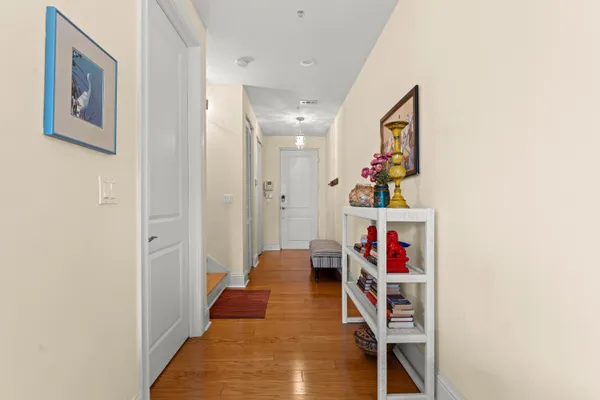 a hallway with a lots of books