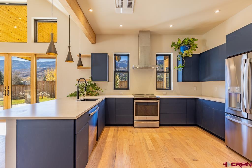 45 West Dalton Road Durango, CO 81301 - Photo 11 of 43 a kitchen with stainless steel appliances granite countertop a sink and stove