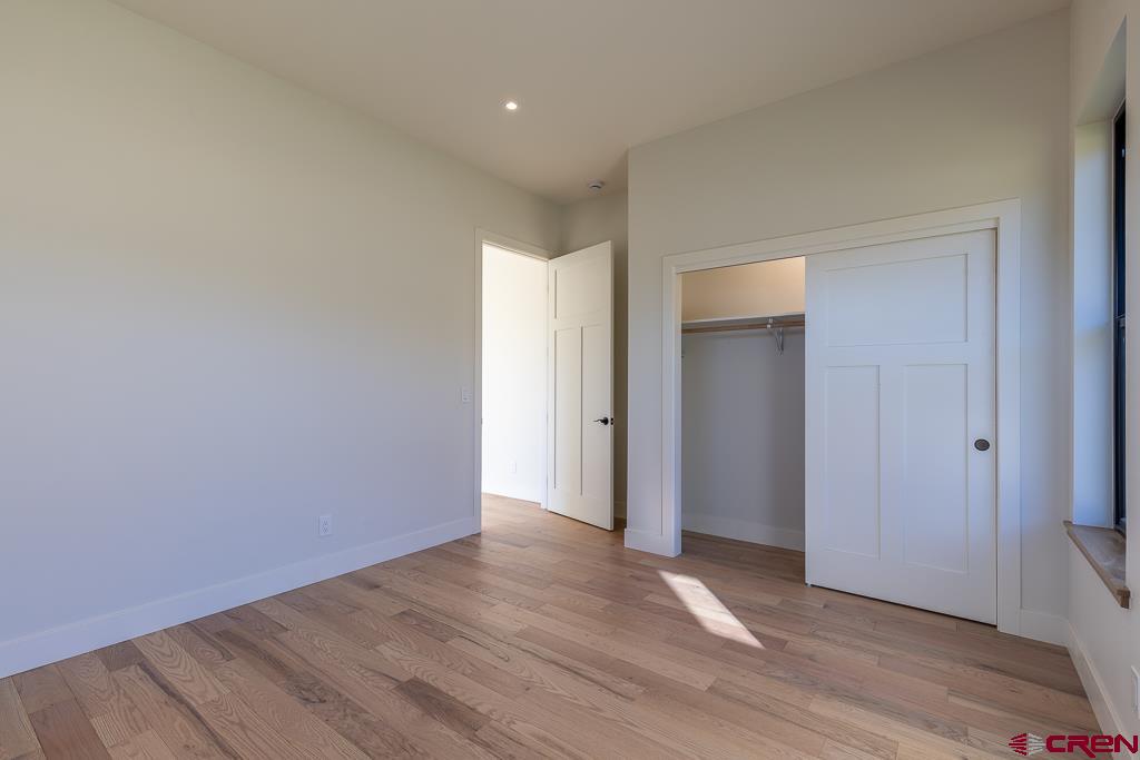 45 West Dalton Road Durango, CO 81301 - Photo 26 of 43 a view of an empty room with wooden floor