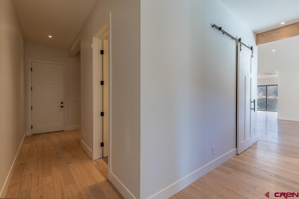 45 West Dalton Road Durango, CO 81301 - Photo 27 of 43 a view of a hallway with wooden floor
