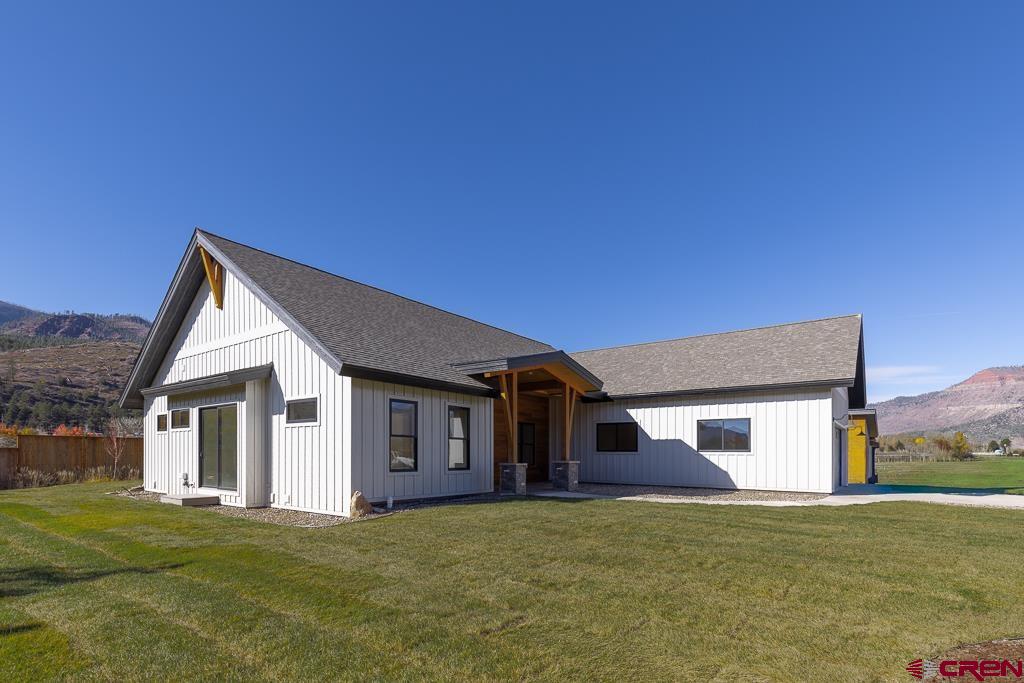 45 West Dalton Road Durango, CO 81301 - Photo 35 of 43 a front view of a house with a garden