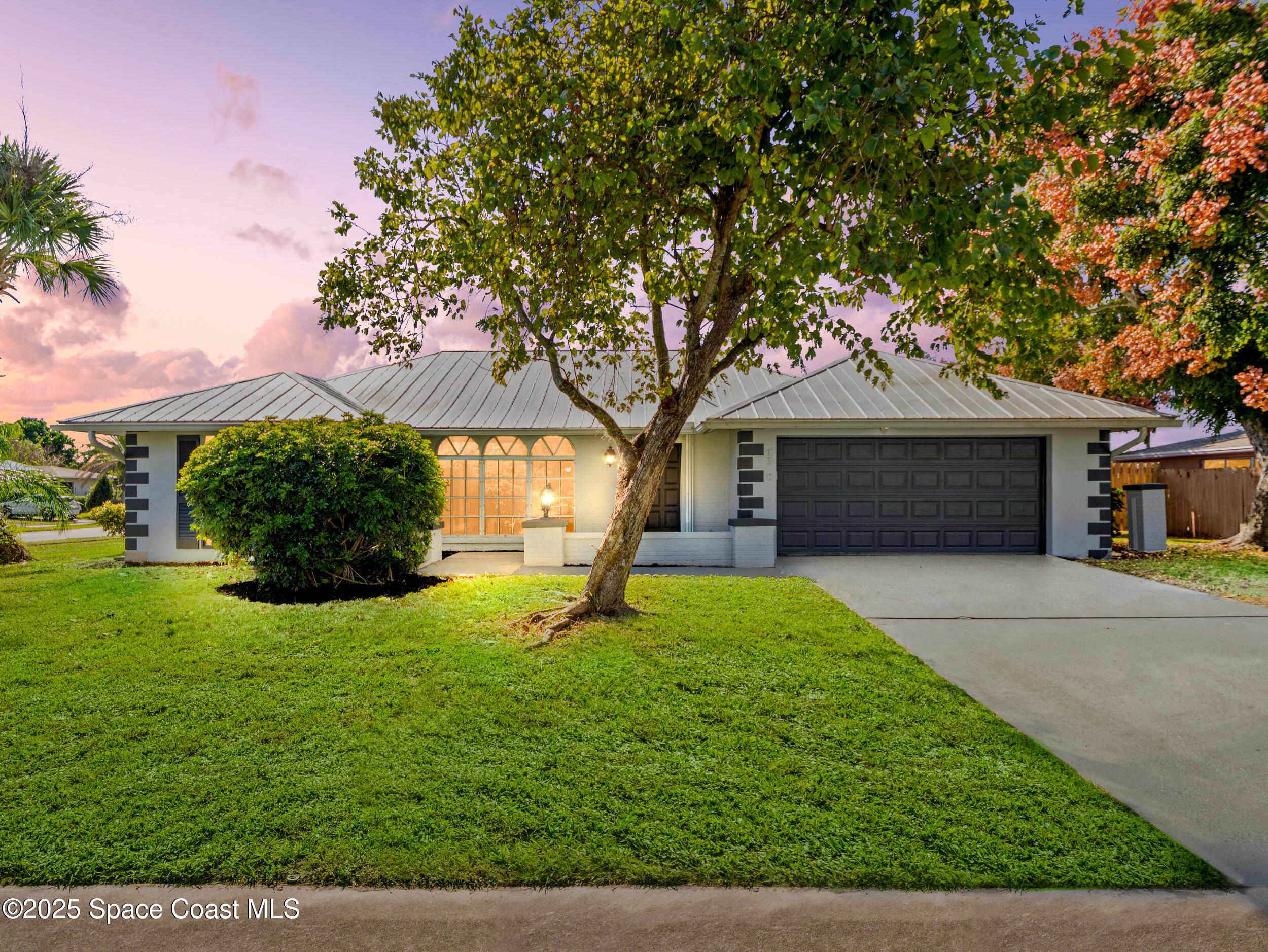 1348 Cromey Road Northeast Palm Bay, FL 32905 - Photo 1 of 47 front