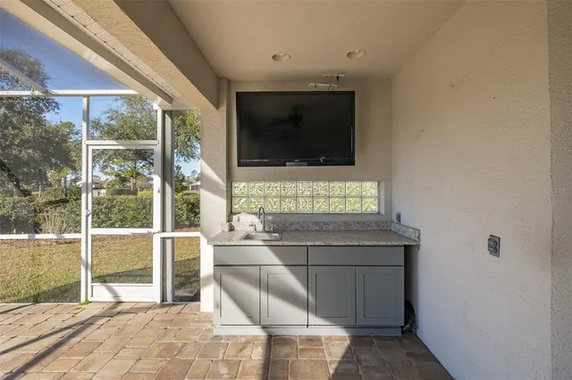 an aerial view of a house with a garden view