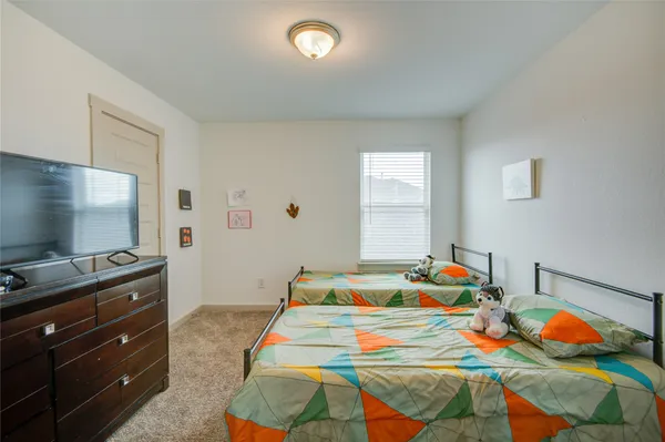 a bathroom with a shower and a toilet