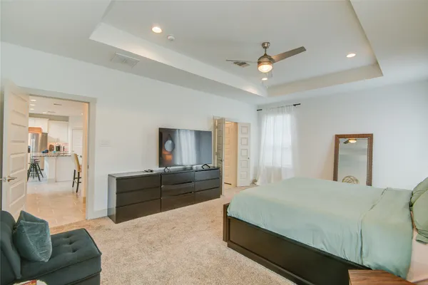 a bathroom with a sink a mirror and a shower