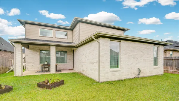 a view of a yard with a swimming pool