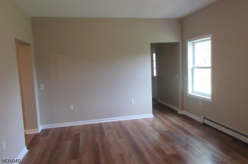 28 Beaver Run Road Lafayette, NJ 07848 - Photo 25 of 36 an empty room with wooden floor and windows