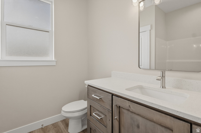 169 West 100 South Joseph, UT 84739 - Photo 23 of 35 Bathroom featuring vanity and light wood-type flooring