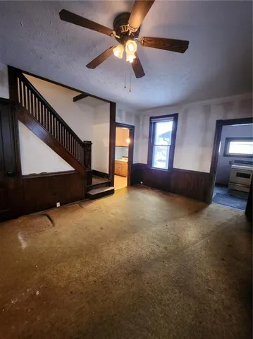 a kitchen that has a sink and a stove