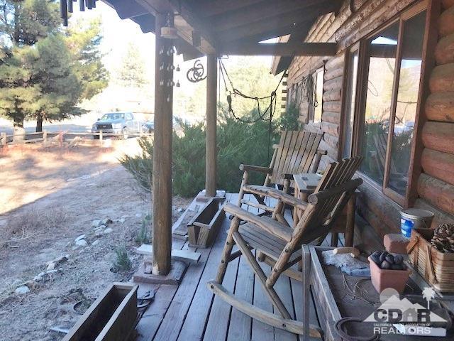 35155 Tool Box Spring Road Mountain Center, CA 92561 - Photo 2 of 27 a view of balcony with furniture