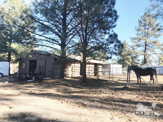 35155 Tool Box Spring Road Mountain Center, CA 92561 - Photo 18 of 27 a view of a house with a yard