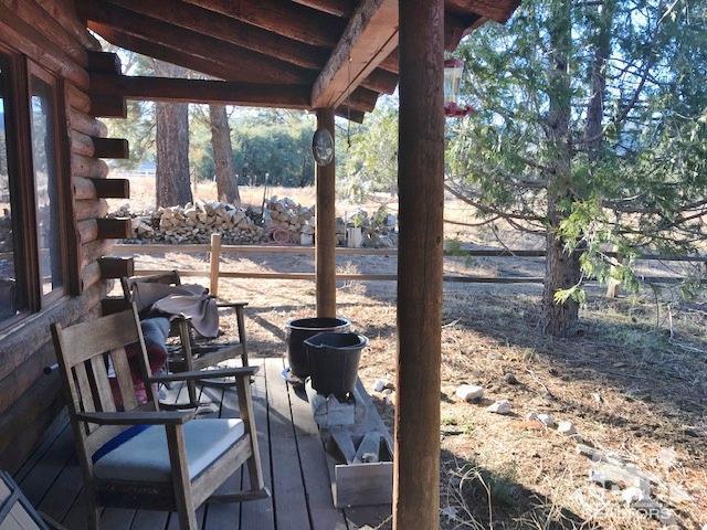 35155 Tool Box Spring Road Mountain Center, CA 92561 - Photo 3 of 27 a view of a chairs and table in patio