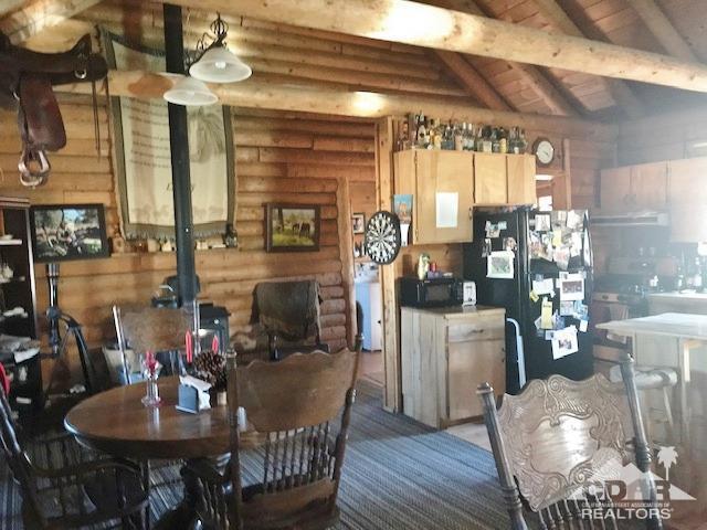 35155 Tool Box Spring Road Mountain Center, CA 92561 - Photo 7 of 27 a view of a dining room with furniture and window