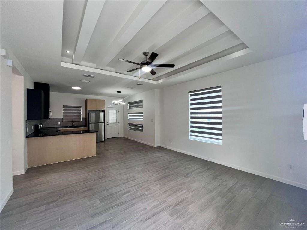 3900 Ventura Avenue, Unit 3 Edinburg, TX 78541 - Photo 13 of 14 a view of a kitchen with a sink and a stove top oven
