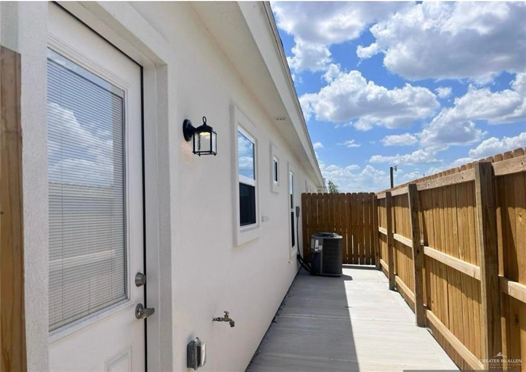 3900 Ventura Avenue, Unit 3 Edinburg, TX 78541 - Photo 2 of 14 a view of a house with wooden walls