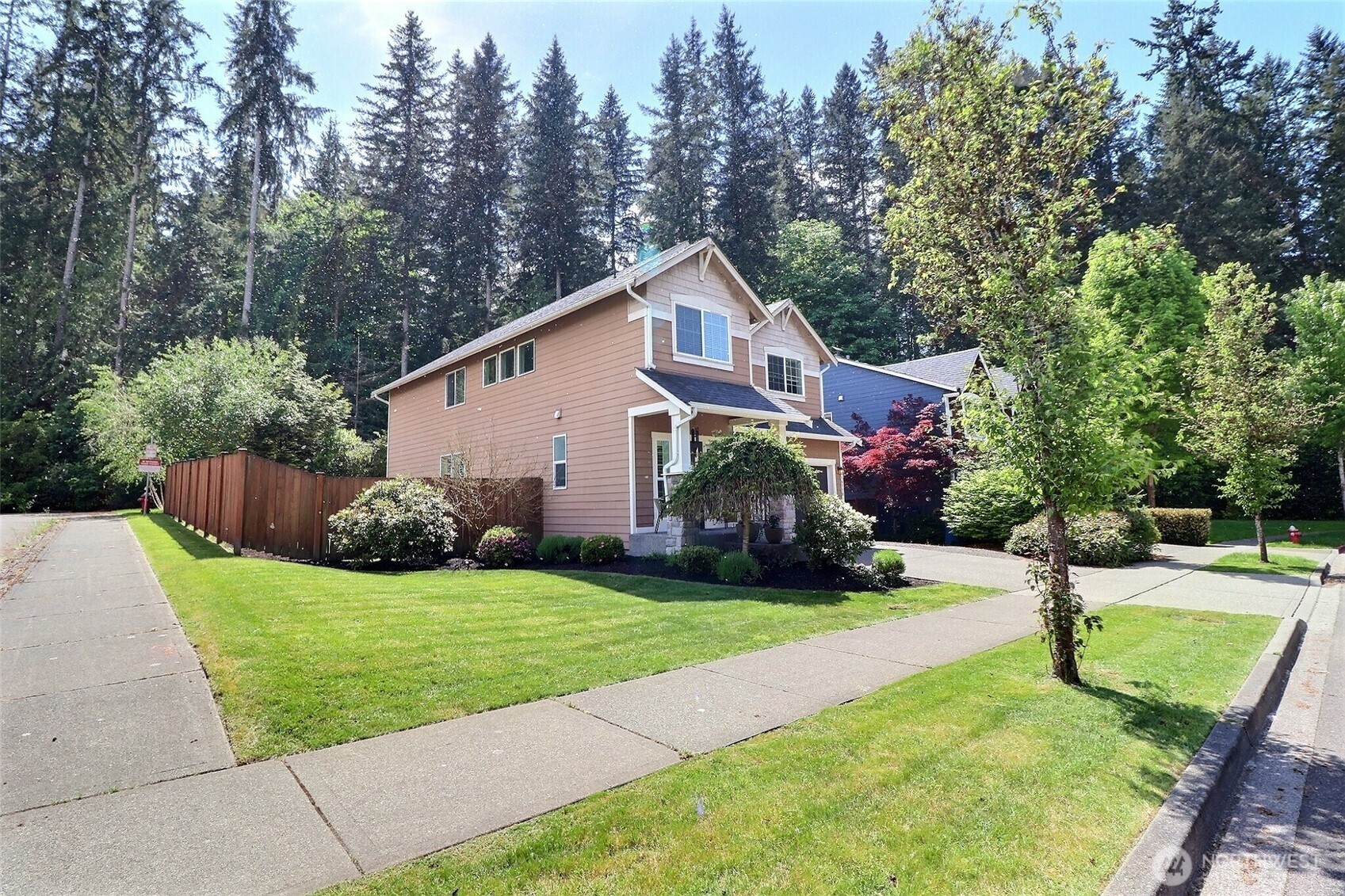 19776 Mountain Ridge Road Southeast Monroe, WA 98272 - Photo 38 of 40 a front view of a house with garden